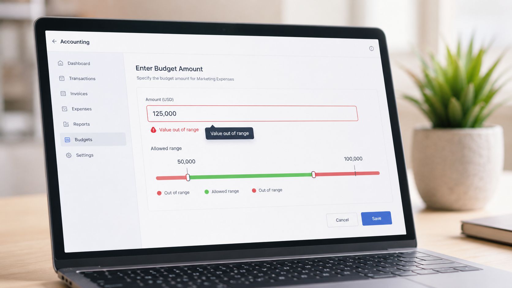 A laptop screen displaying an accounting software interface showing a budget input error message.